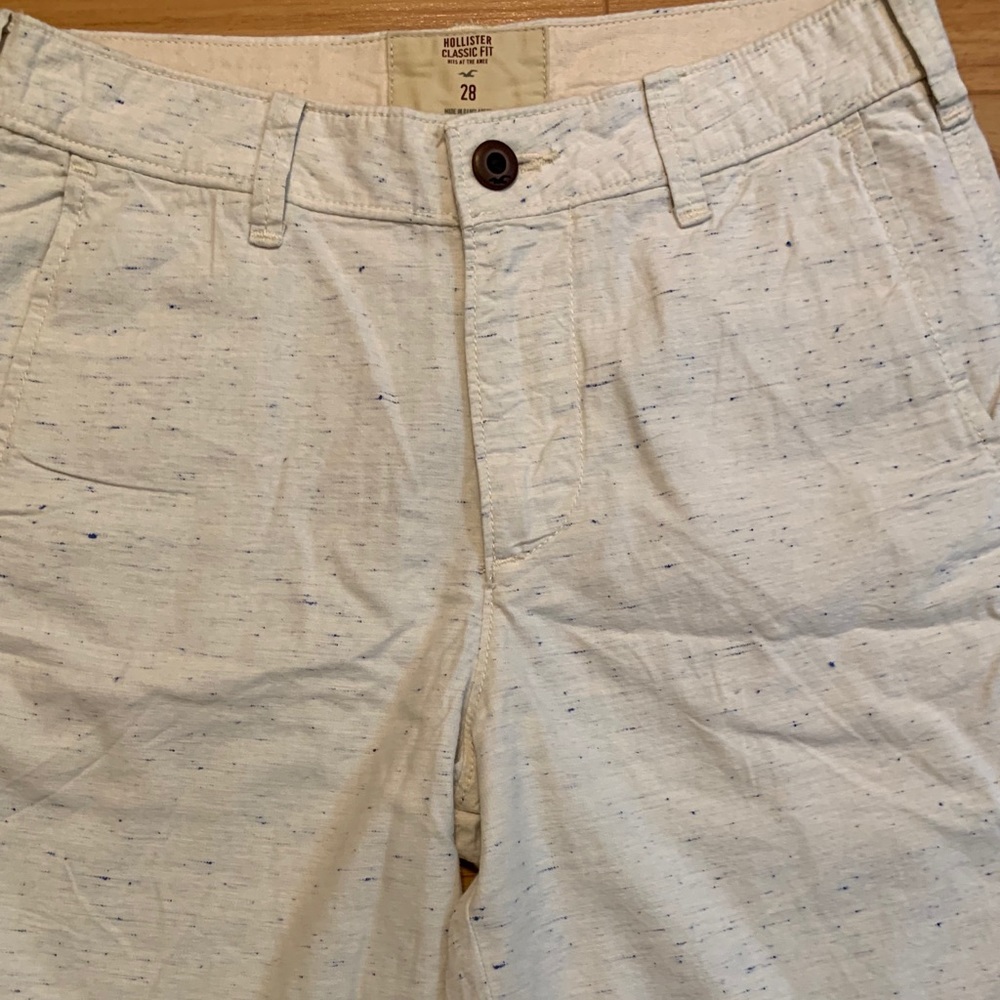 Hollister cream shorts with blue specs